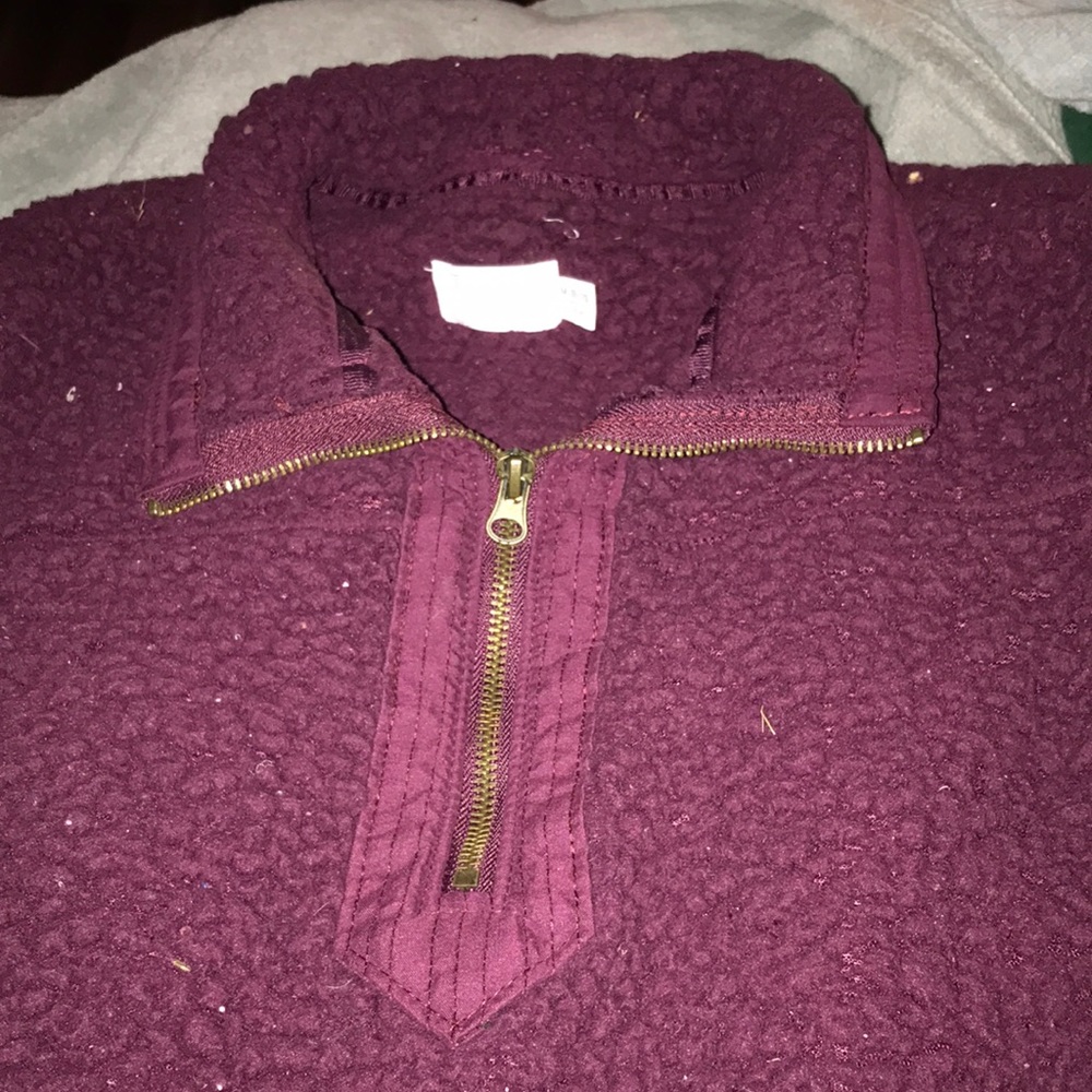 half zip up, soft fur, ive only had it for a year.